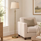 Antique bronze floor lamp beside a sofa to show its height