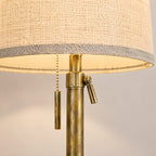 Close-up of the antique bronze finish and linen shade