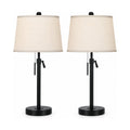 Black adjustable table lamps, set of two, product shot on a white background