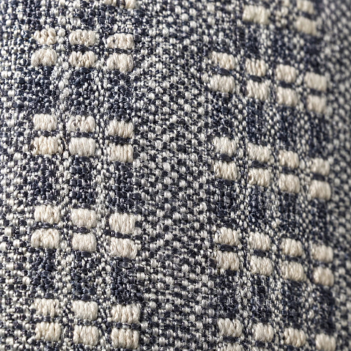 Close-up of the navy cushion fabric