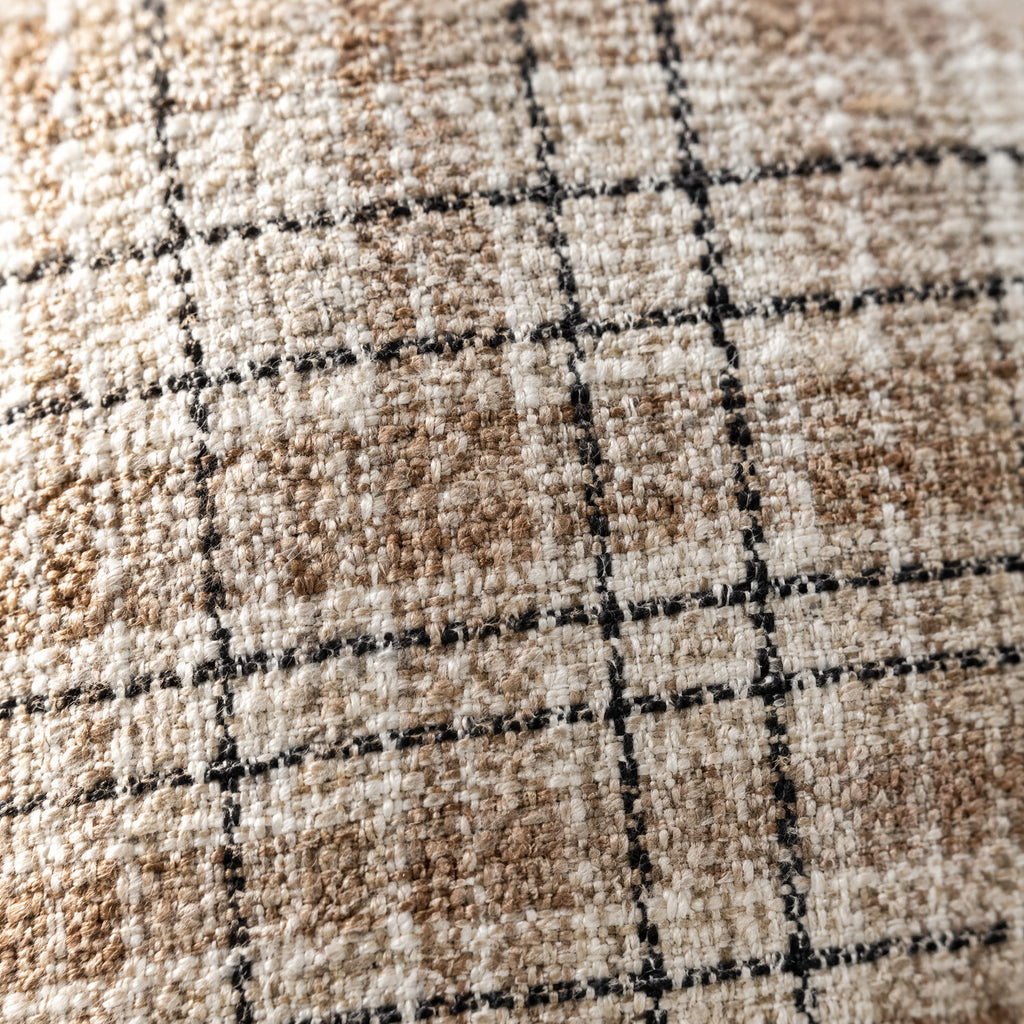 Close-up of the beige and black check weave