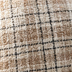 Close-up of the beige and black check weave