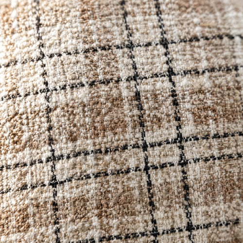 Close-up of the beige and black check weave
