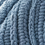 Close-up of the dusty blue chunky knit weave