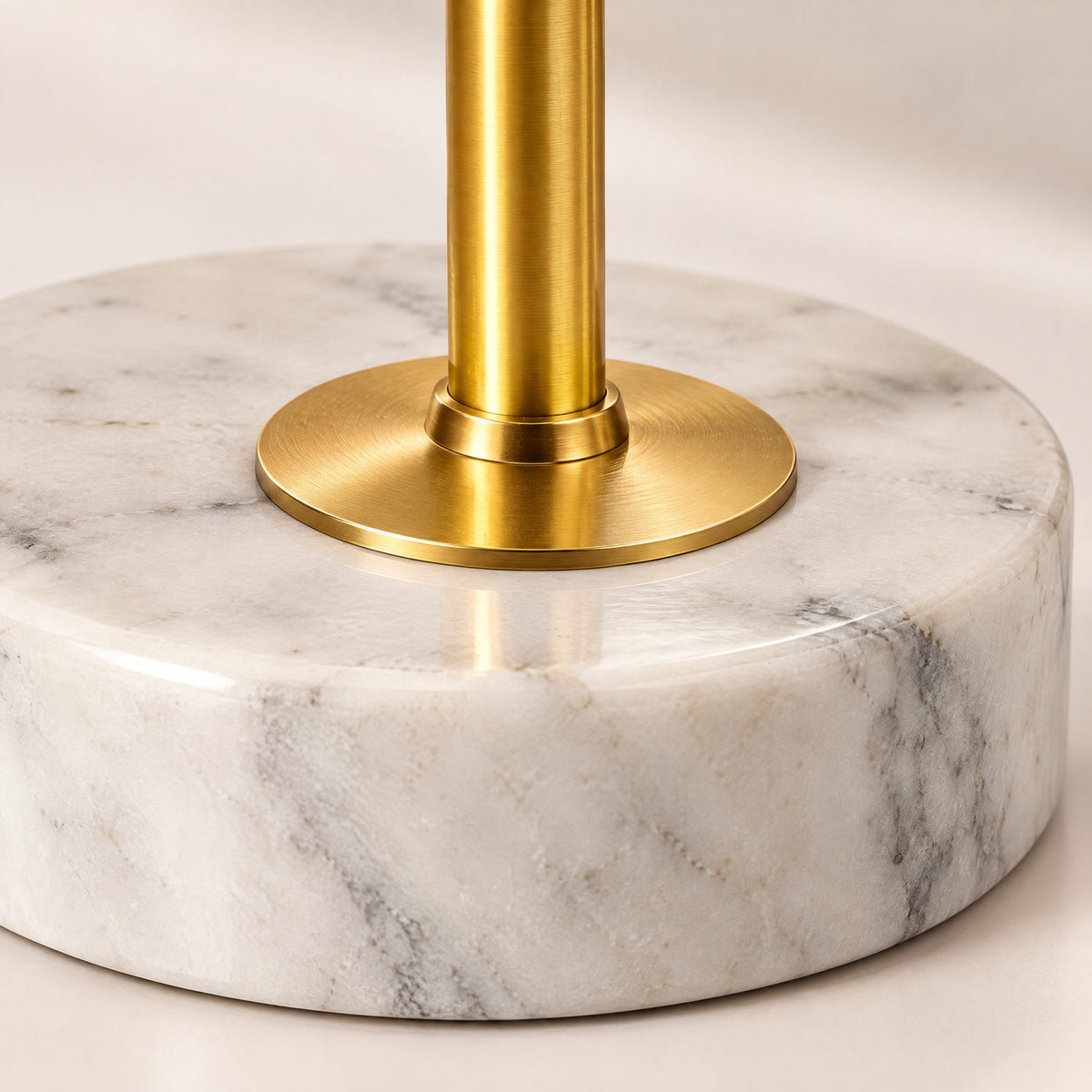 Close-up of the marble base and gold detailing
