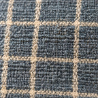 Close-up of the golden and blue plaid weave