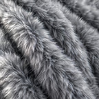 Close-up of the grey faux fur pile