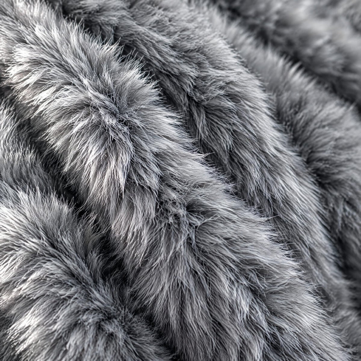 Close-up of the grey faux fur pile