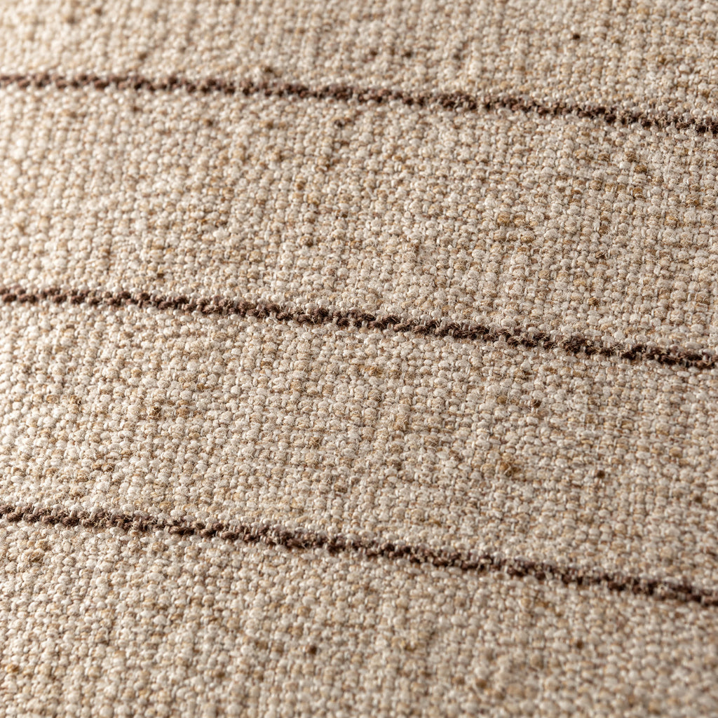 Close-up of the Keisha cushion weave in natural and brown