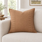 Nadine terracotta cushion on a sofa to show its size