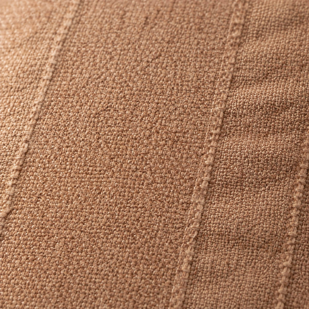 Close-up of the terracotta cushion fabric