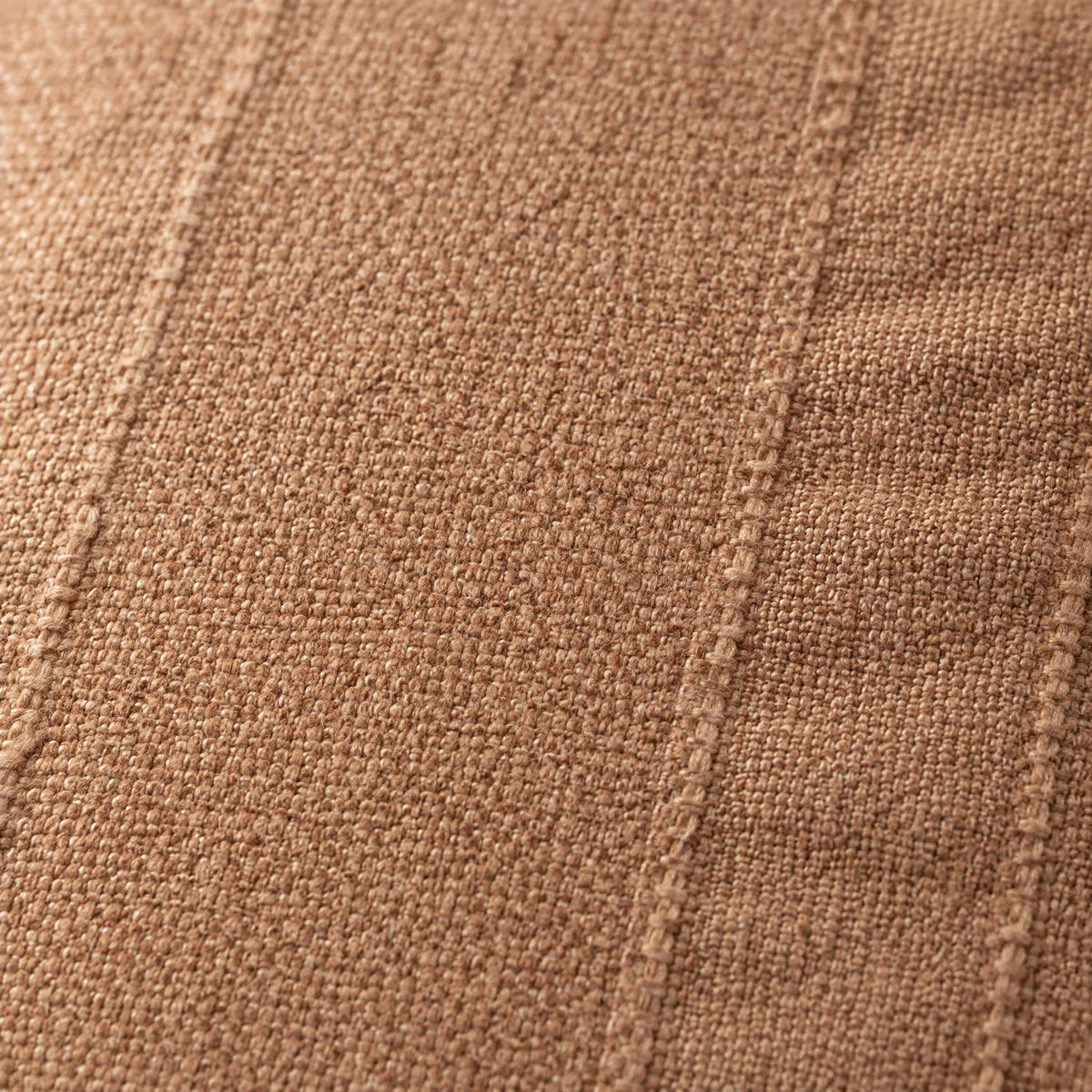 Close-up of the terracotta cushion fabric