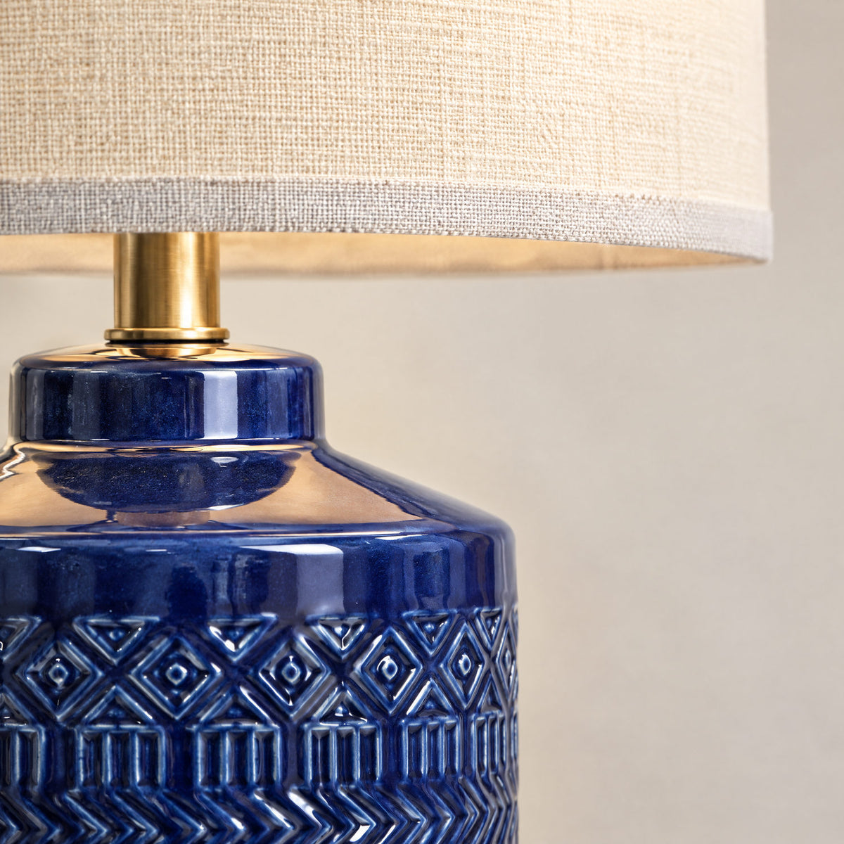 Close-up of the navy ceramic glaze and shade fabric