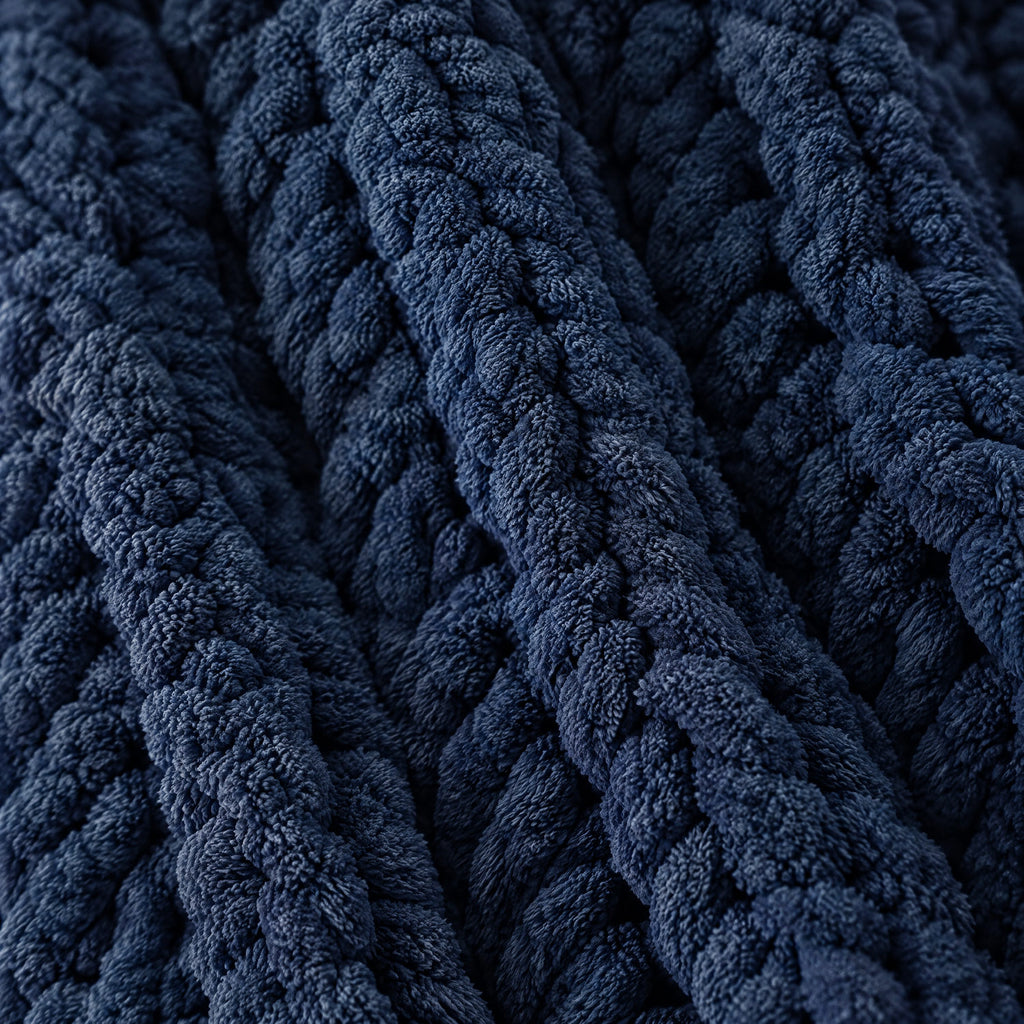 Close-up of the navy chunky knit weave